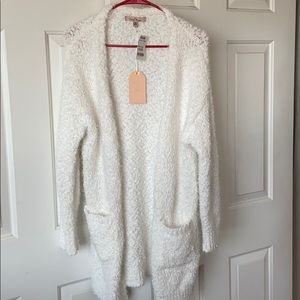 White cardigan sweater